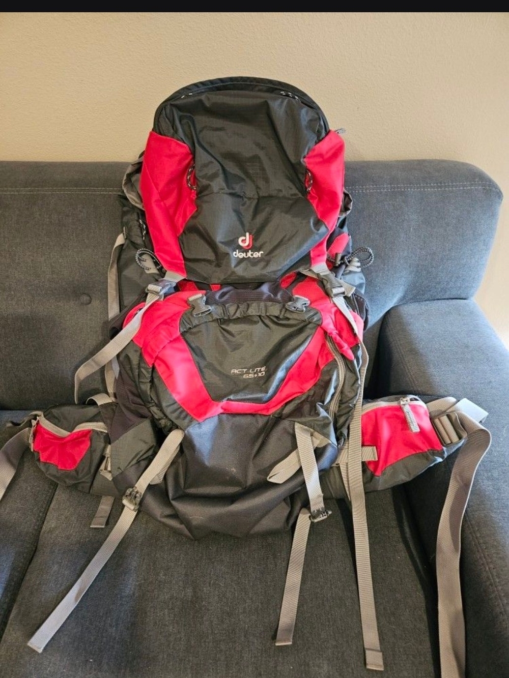 Deuter ACT Lite 65 + 10 Hiking Backpack in Black & Red